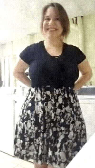 Mal Malloy lifts skirt, revealing big round ass