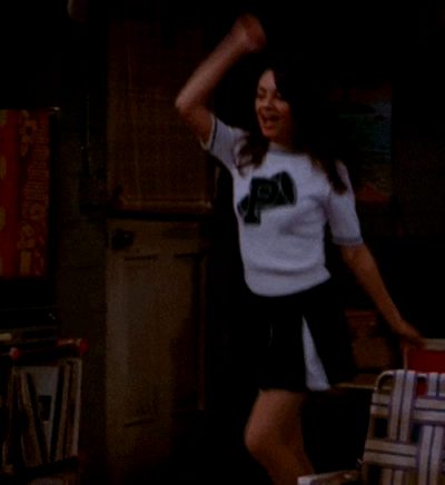 Mila Kunis In A Cheerleader Costume